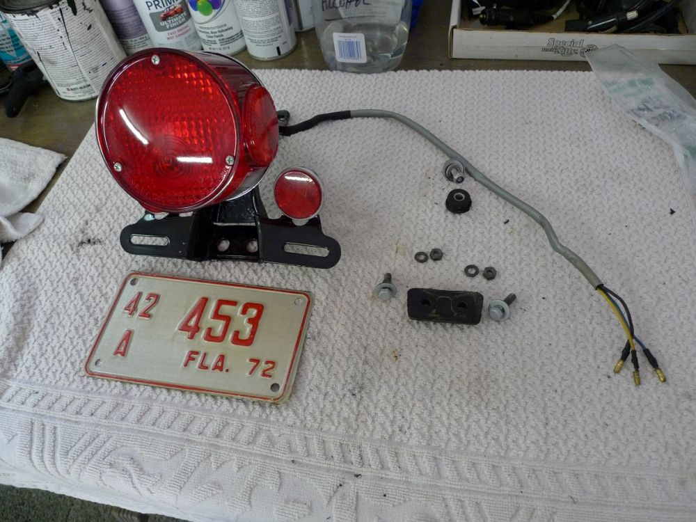 L1000796.jpg - New tail light, refinished bracket and wiring, and 1972 Florida license plate I hope to use.