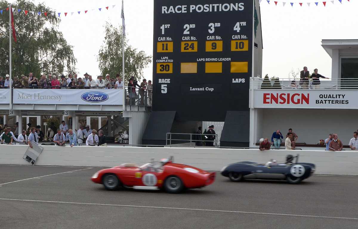 L1010781.JPG - Speed shot. The yin and yang of front engine sports racers. Old school Ferrari and new tech Lotus 17.