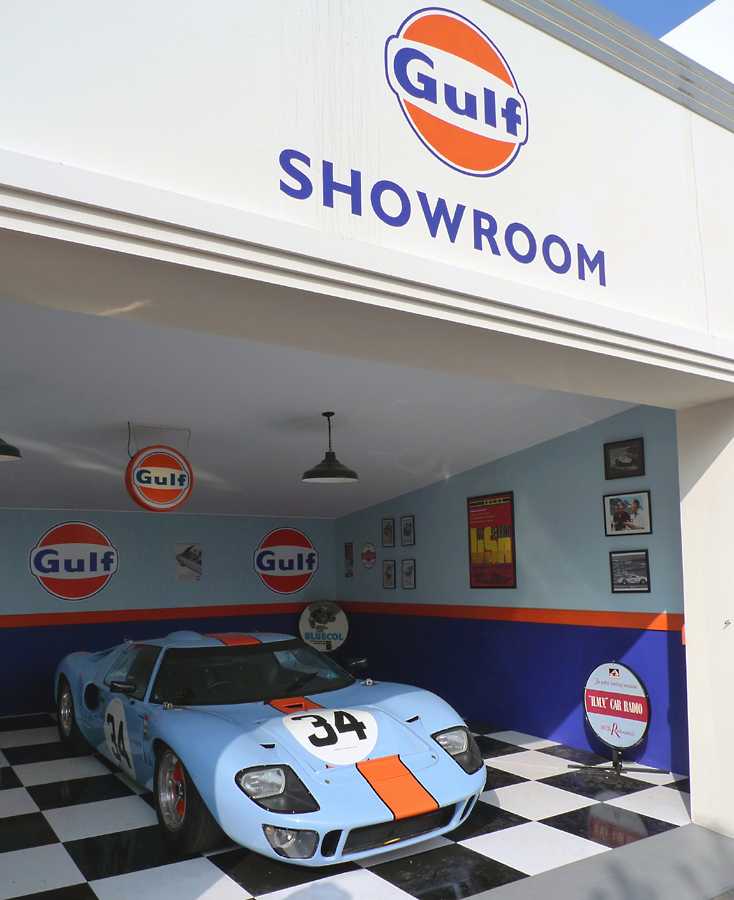 L1010849.JPG - Several garages were decorated and used as displays. Note the Gurney bubble on the roof of the GT40.