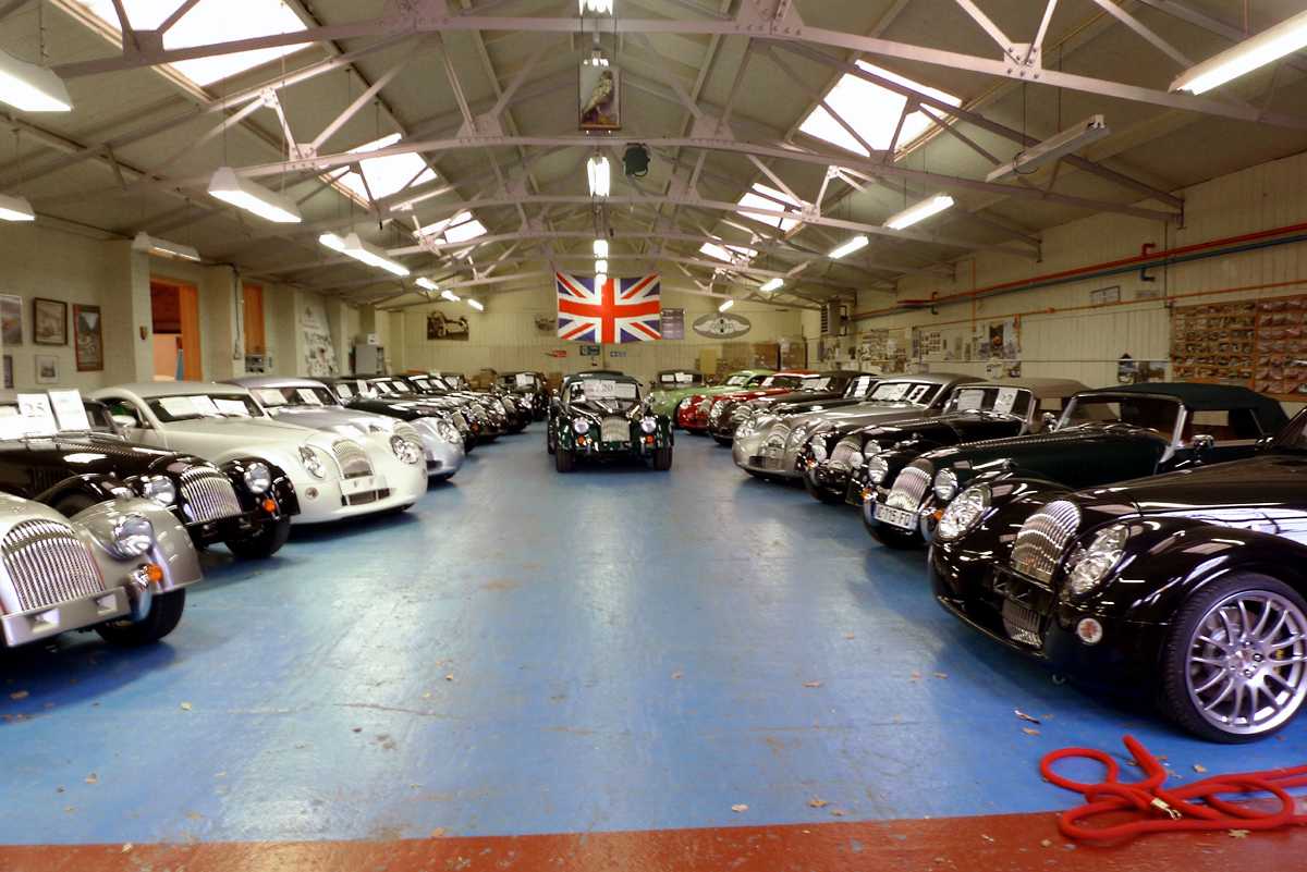 L1010483.JPG - The Morgan works consists of several large garage type buildings. This is the new car delivery area.